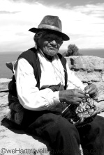 An old gentlemen of Taquile demonstrating his knitting skills